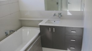Full bathroom with vanity